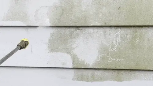 JetStorm cleaning weathered siding