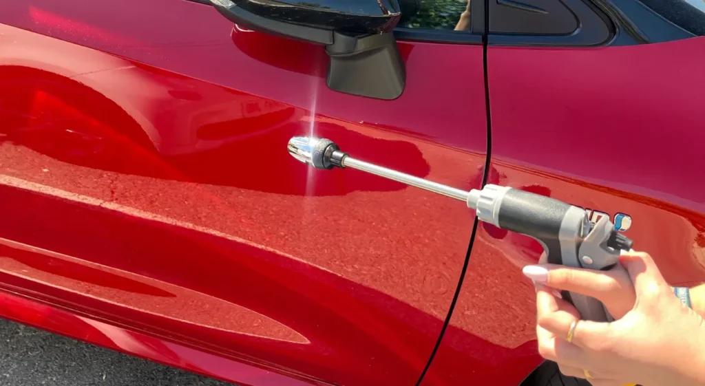 JetStorm used to wash a red car